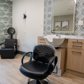 Enjoy our resident-only features a salon with a hair sink and mirror